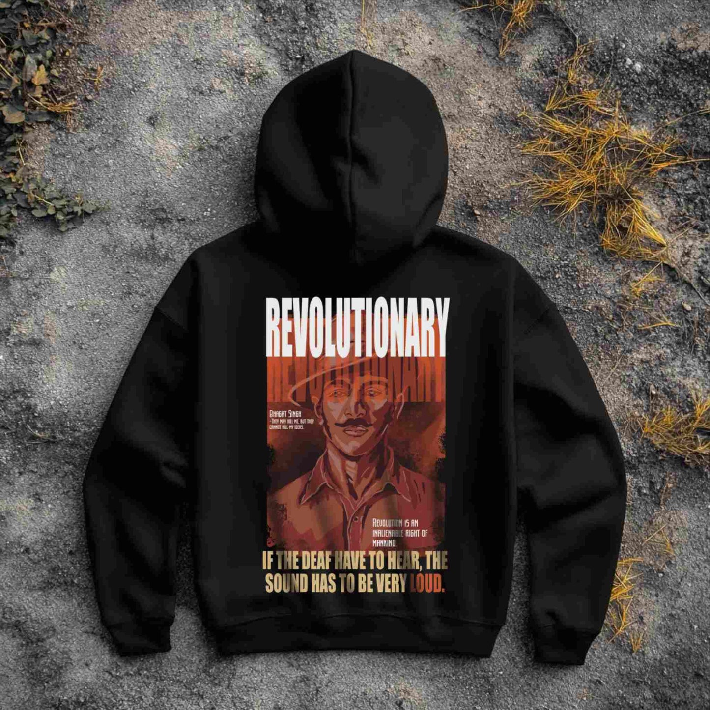 Black hoodie with a graphic design and text on a textured surface